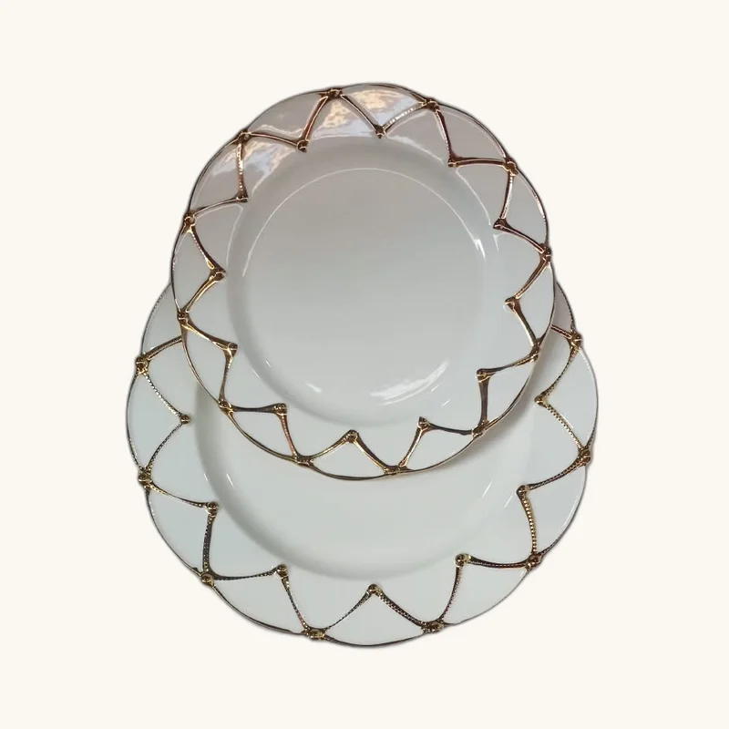 Luxury White Ceramic Dinner Plate with Gold Geometric Rim presented on brand studio background